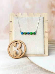 Lila Peacock Dahlia Necklace