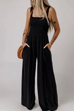 Load image into Gallery viewer, Black smocked jumpsuit
